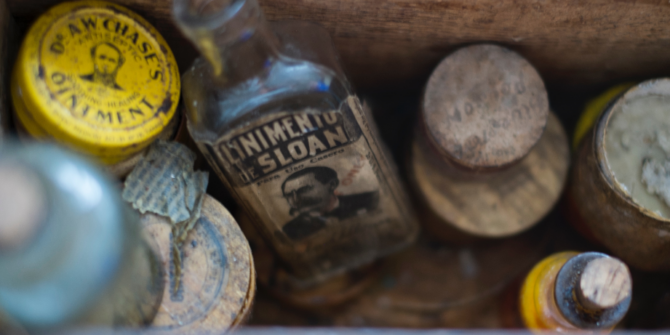 vintage medications in a wooden crate