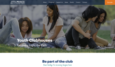 Web page of a group of young adults sitting on the grass.