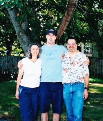 A group of people standing in a yard