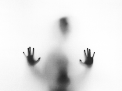 fog of person pressing body against glass