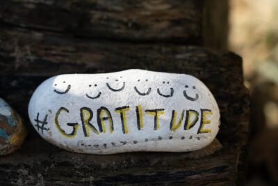 White rock with gratitude written on it